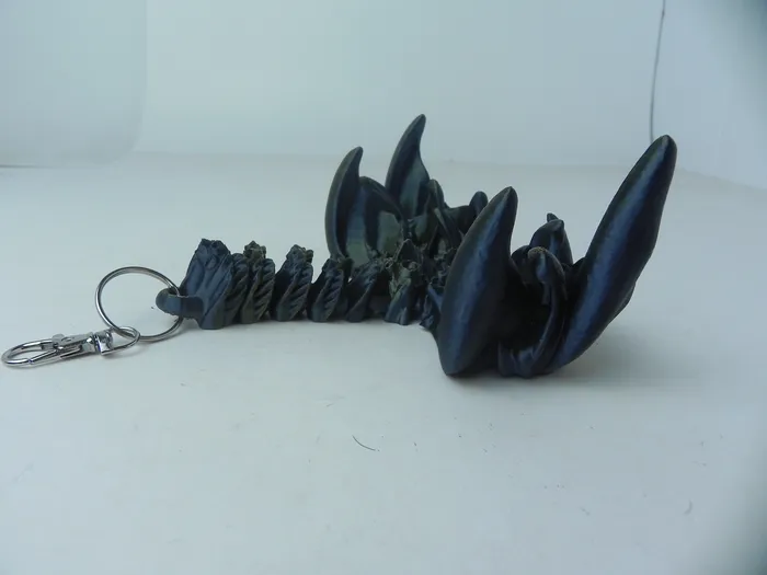 HQPrints Anal Black and Green Coral Dragon Fidget 3D Printed Articulated Dragon Keychain HQPrints Anal Black and Green Coral Dragon Fidget 3D Printed Articulated Dragon Keychain