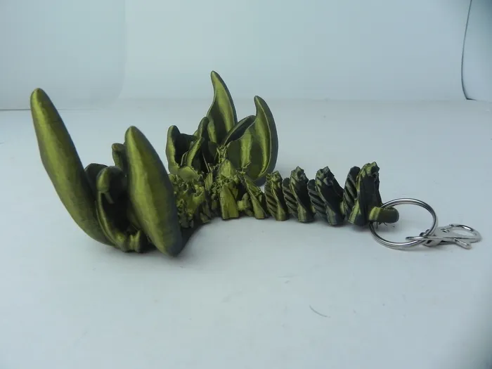 HQPrints Anal Black and Green Coral Dragon Fidget 3D Printed Articulated Dragon Keychain HQPrints Anal Black and Green Coral Dragon Fidget 3D Printed Articulated Dragon Keychain